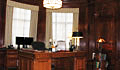 The Office of the President today reuses much of the same wood panel work, ceiling pattern, restored furniture and chandelier as the original office design.