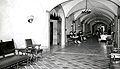 Before advanced technology, messengers, seen here, relayed communications between offices across the Bank.  This picture also shows the original and existing furniture, design,  and layout of the Bank’s 10th floor.  (c. 1950)