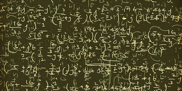 Greenboard with math squiggles for DSGE model artwork
