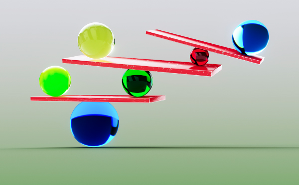 A colorful series of balances created by marbles on ledges on top of one another. 