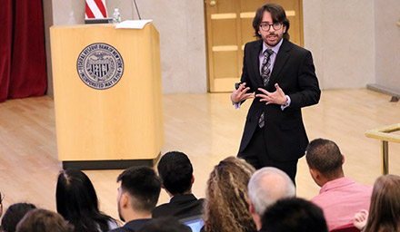 Associate Director of Economic Education Graham Long teaches a group of educators at the Federal Reserve Bank of New York.