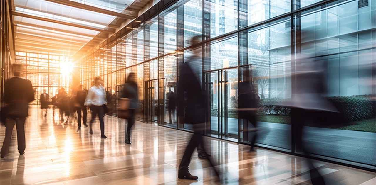 crowd of businesspeople in a bright modern office lobby with long exposure motion blur effect