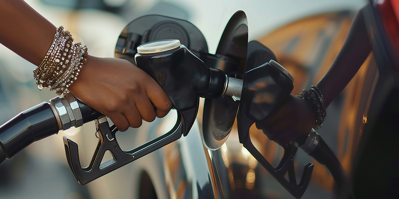 AI generated: Hand Of A Woman Pumping Gas Into A Vehicle