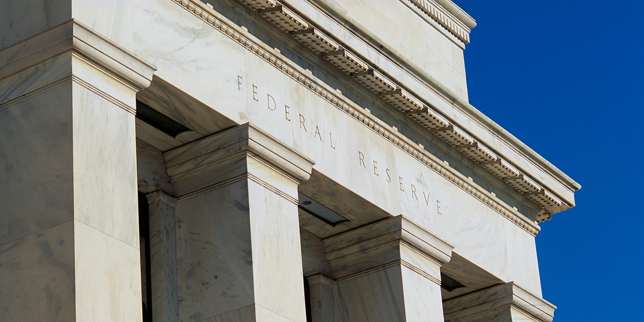 exterior of federal reserve building against blue sky exterior of federal reserve building against blue sky