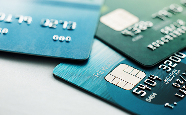 Selective focus credit card payment with close up shot.